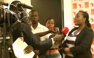 CIPESA Policy Officer being interviewed by journalists 